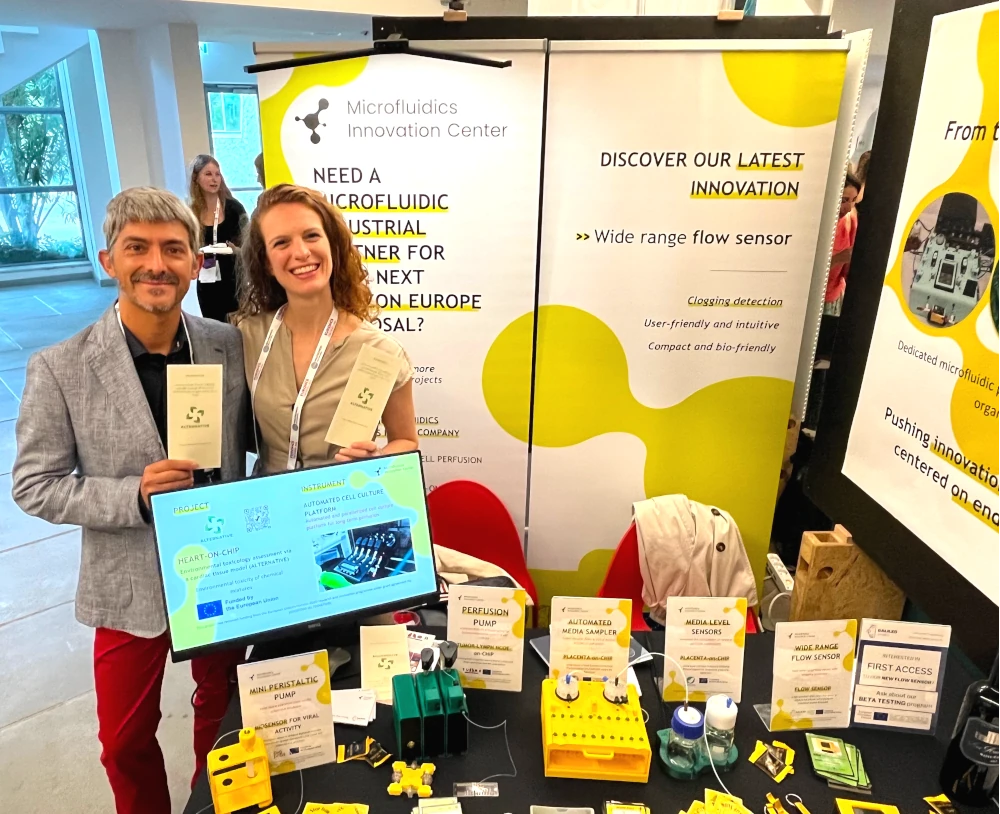 Microfluidics Innovation center booth with partner from Alternative project at EUROoCS in Milan